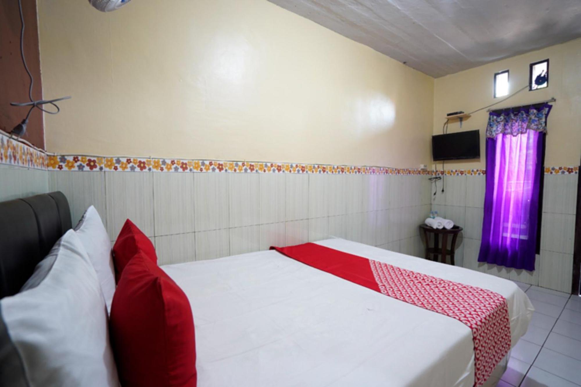 Oyo 927 Carina Hotel Claket Bagian luar foto
