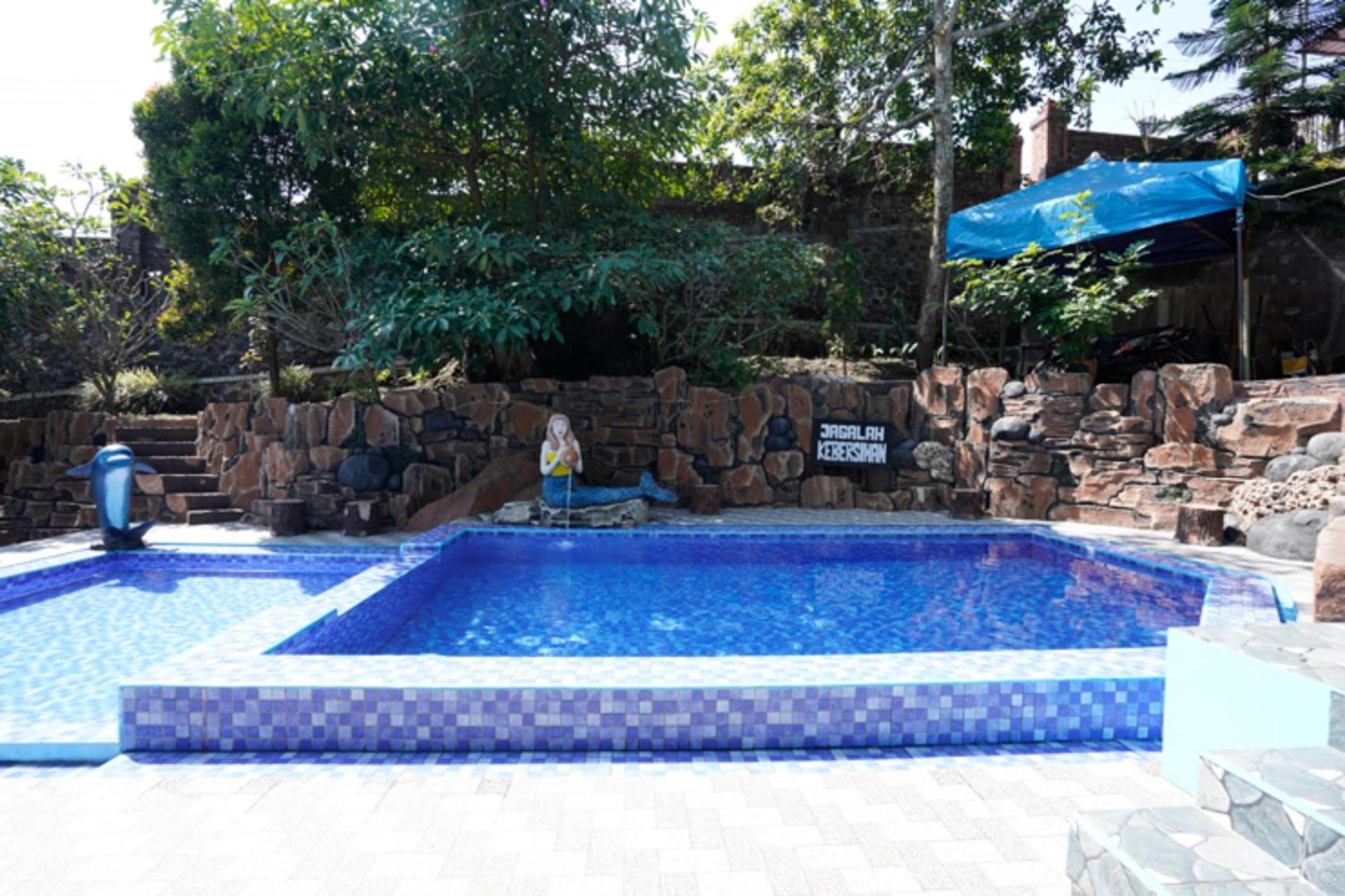 Oyo 927 Carina Hotel Claket Bagian luar foto